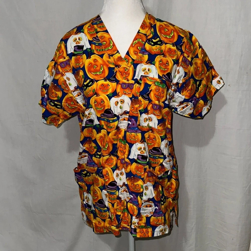 Peaches unisex pumpkin / jack-o'-lantern / Halloween scrub top size xs - Picture 1 of 3